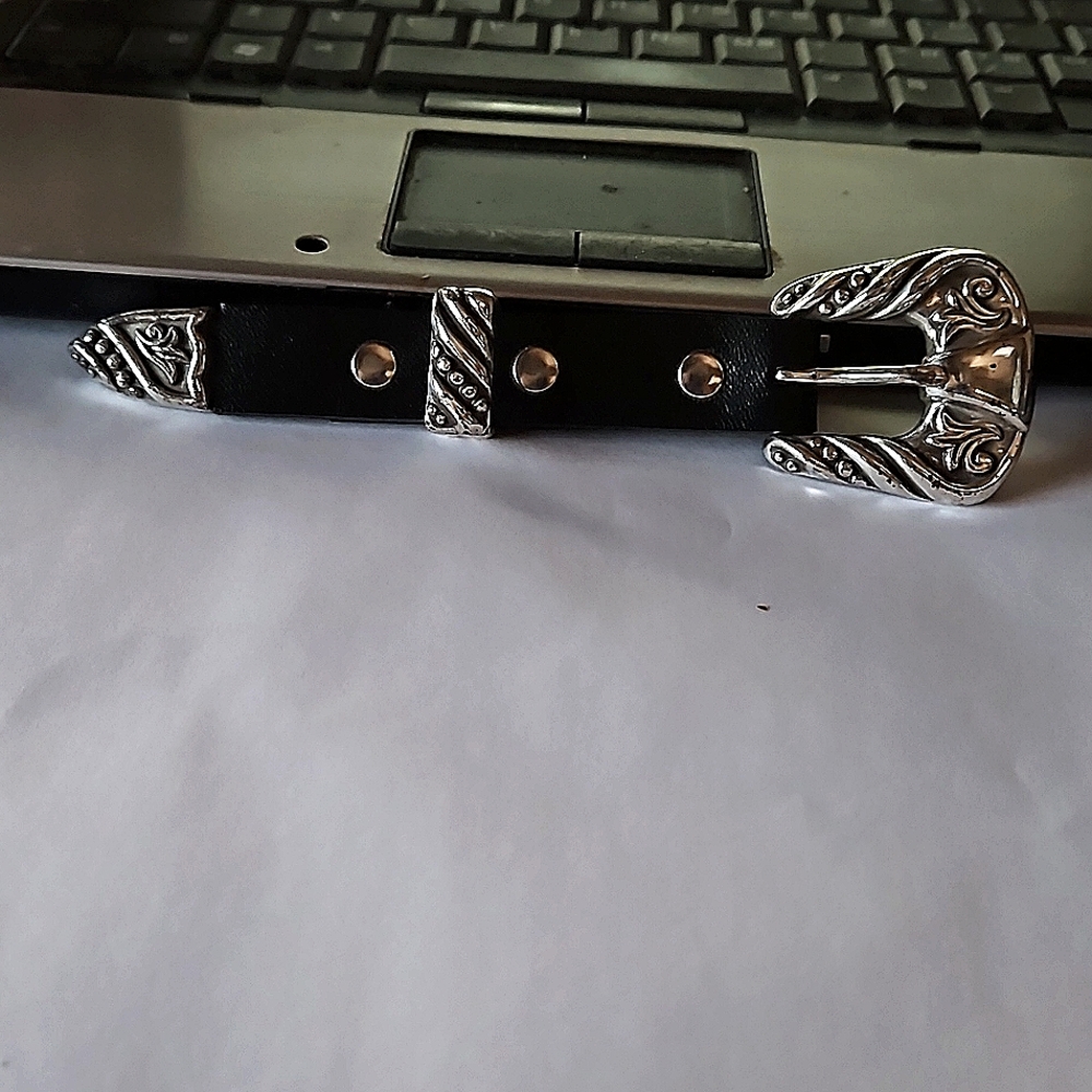Nocona belt buckle, tip, and keeper